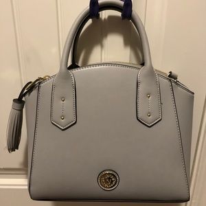 Grey Anne Klein’s handbag